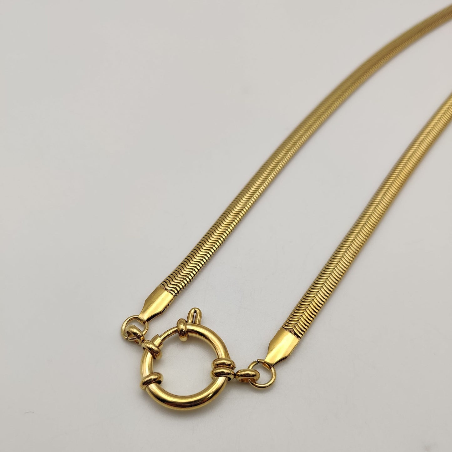 Serpentine charm chain