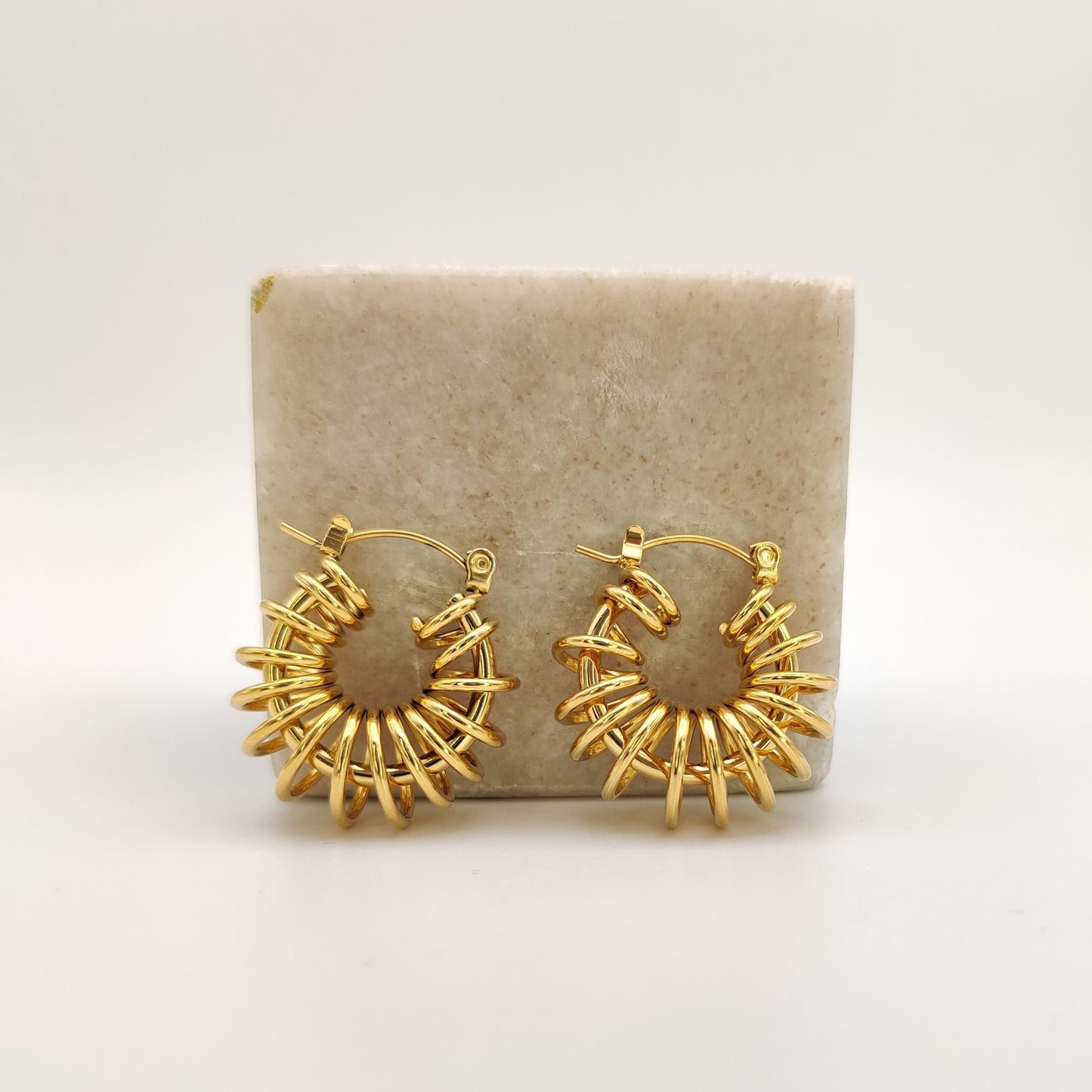 Coiled up hoops