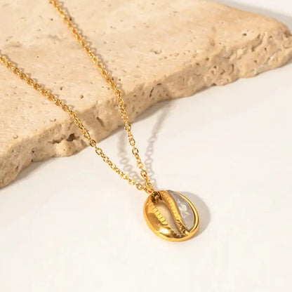 Cowrie shell pendant